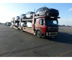 Transport autorizat autoturisme pe trailer